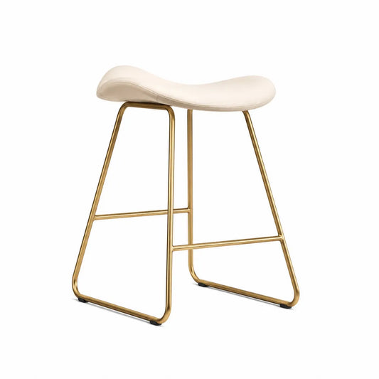 Tabouret en cuir synthétique beige avec structure métallique dorée
