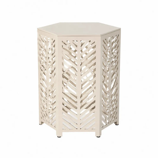 Table hexagonale en métal découpé couleur crème 55 cm